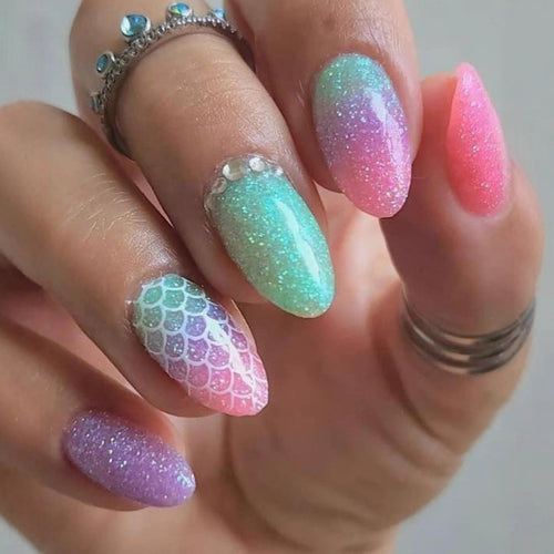 Creative glitter art nails with colorful gradient and scale design Bowlift