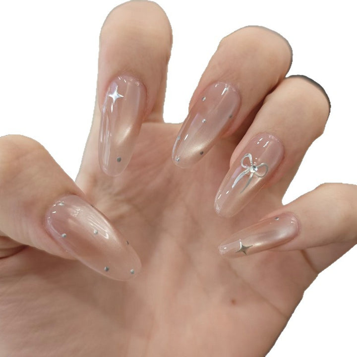 Elegant Stiletto Nail Tips with Bow Accents Bowlift