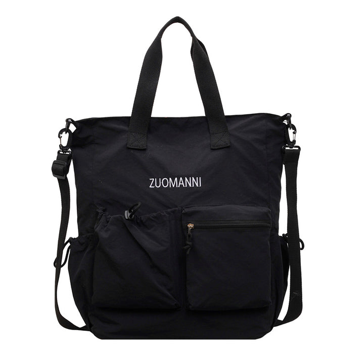 Tote bag with multifunctional outer pockets and adjustable shoulder strap Bowlift