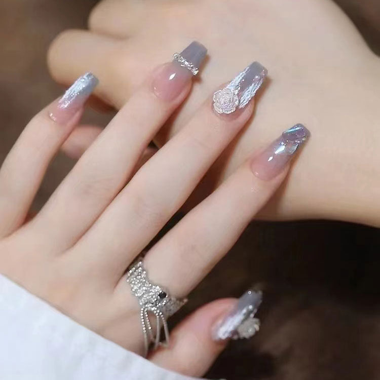 Nails with 3D flowers and glitter Bowlift