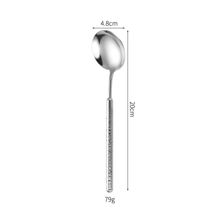 Elegant dessert spoon with elaborate handle design Bowlift