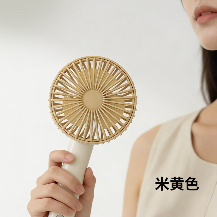 Women's portable handheld fan with ergonomic grip and powerful battery technology Bowlift