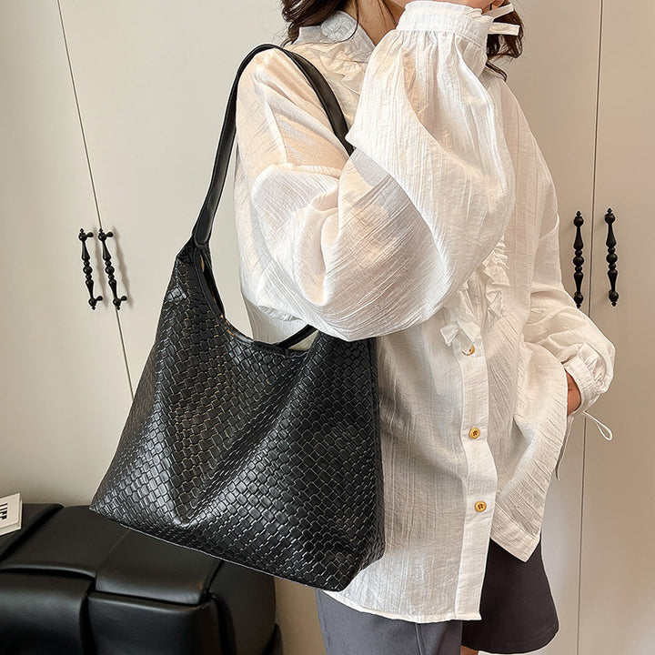 Sleek Textured Leather Hobo Handbag Bowlift