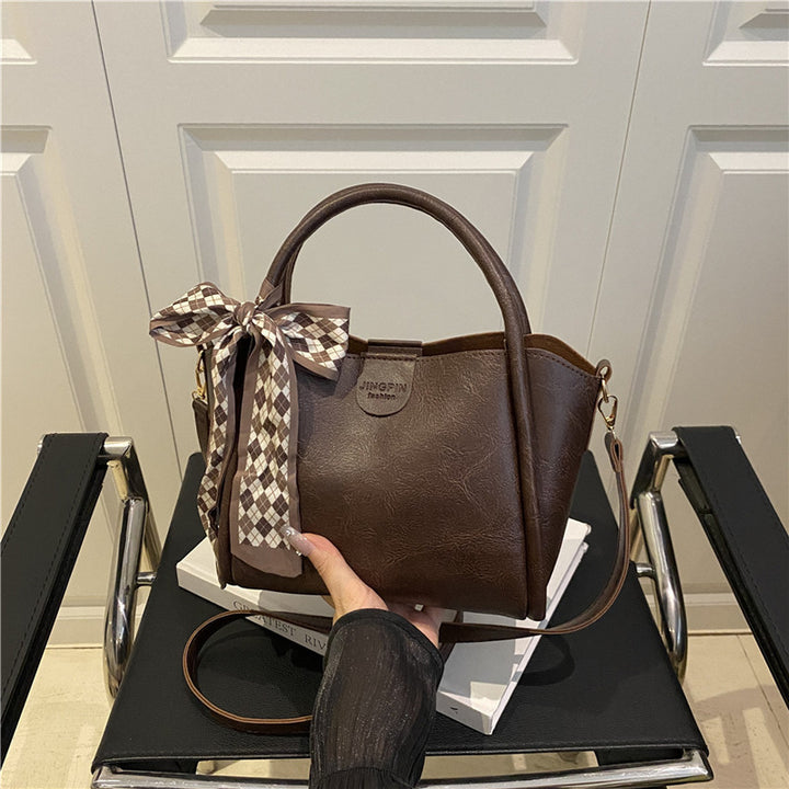 Elegant Bow Accent Handbag Bowlift