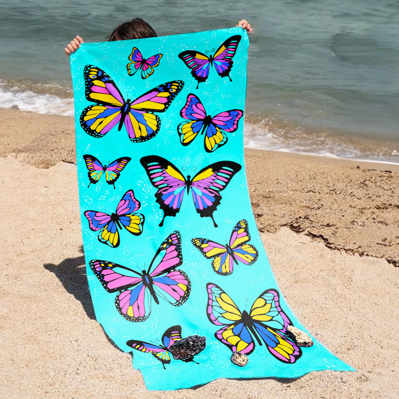 Beach towel with vibrant, colorful animal motif Bowlift