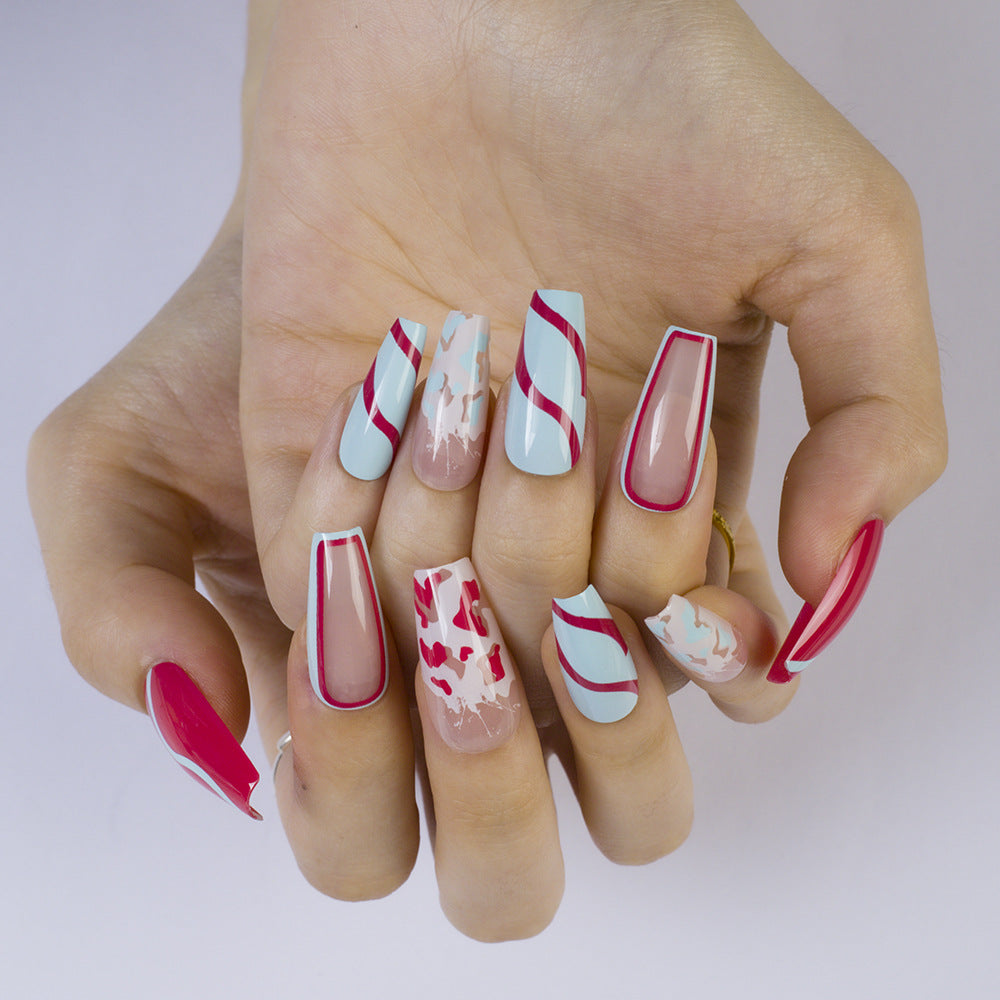 Artificial nails with modern wave pattern and heart accents Bowlift