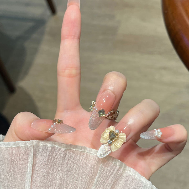 Glamorous Rhinestone-Embellished Nail Art Extensions Bowlift