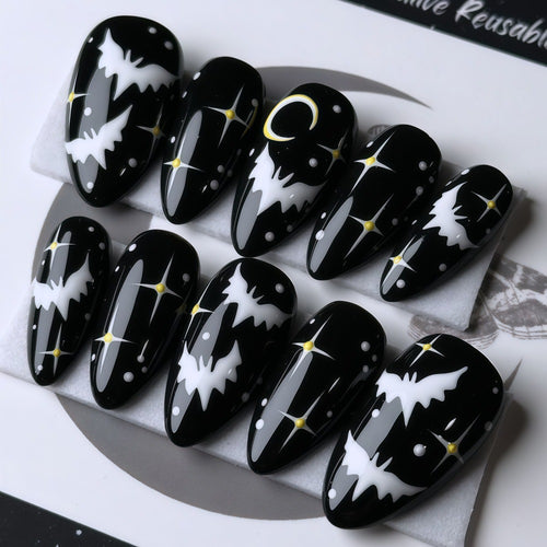 Artificial nails in creative Halloween bat design Bowlift