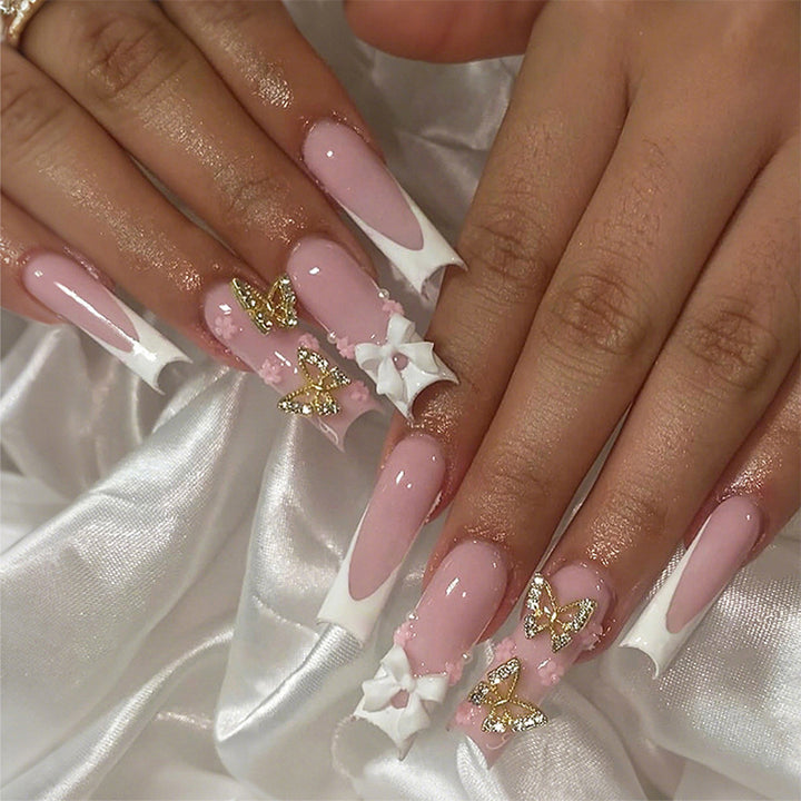 Artificial nail set with elegant butterfly and bow accents Bowlift