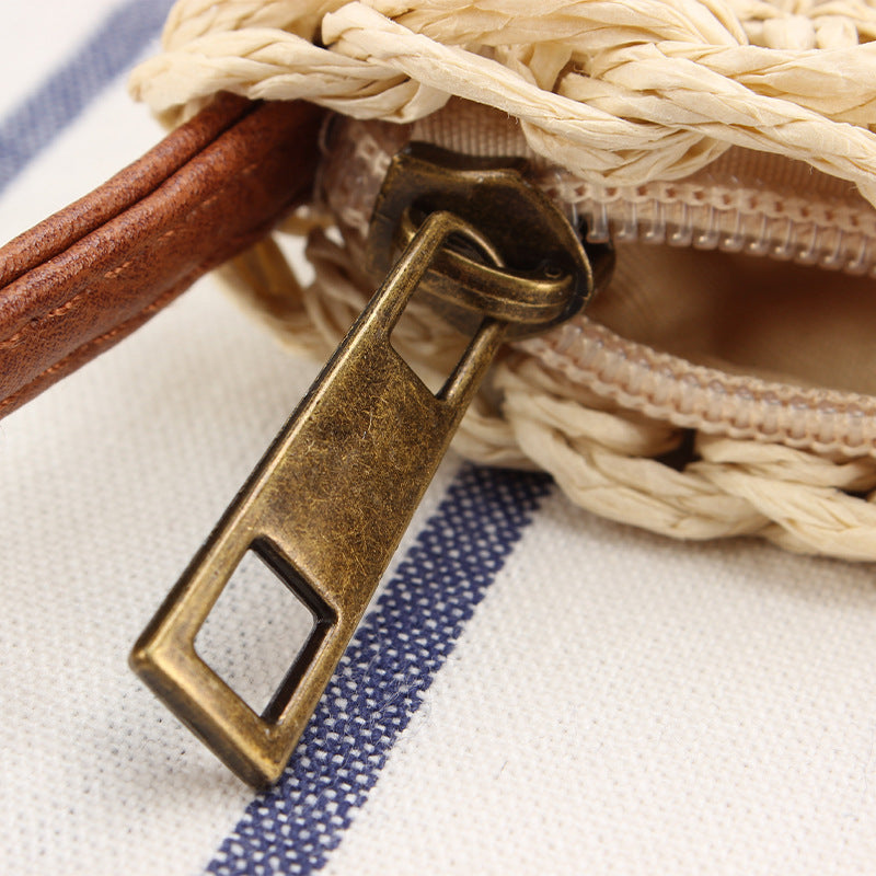 Braided shoulder bag with leather accents Bowlift