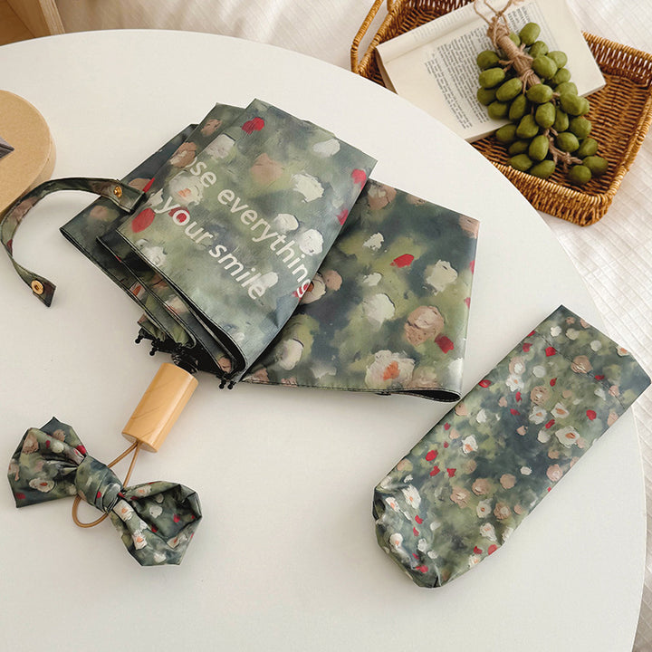 Ladies Folding Umbrella with Floral Design Bowlift