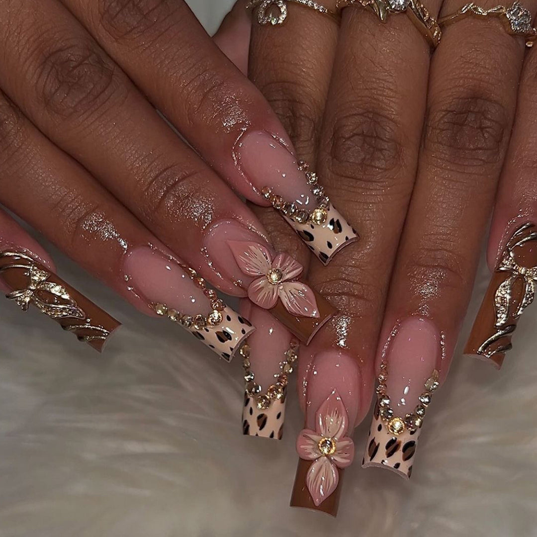 Artistic Long Press-On Nail Extensions with Elegant Floral Design Bowlift