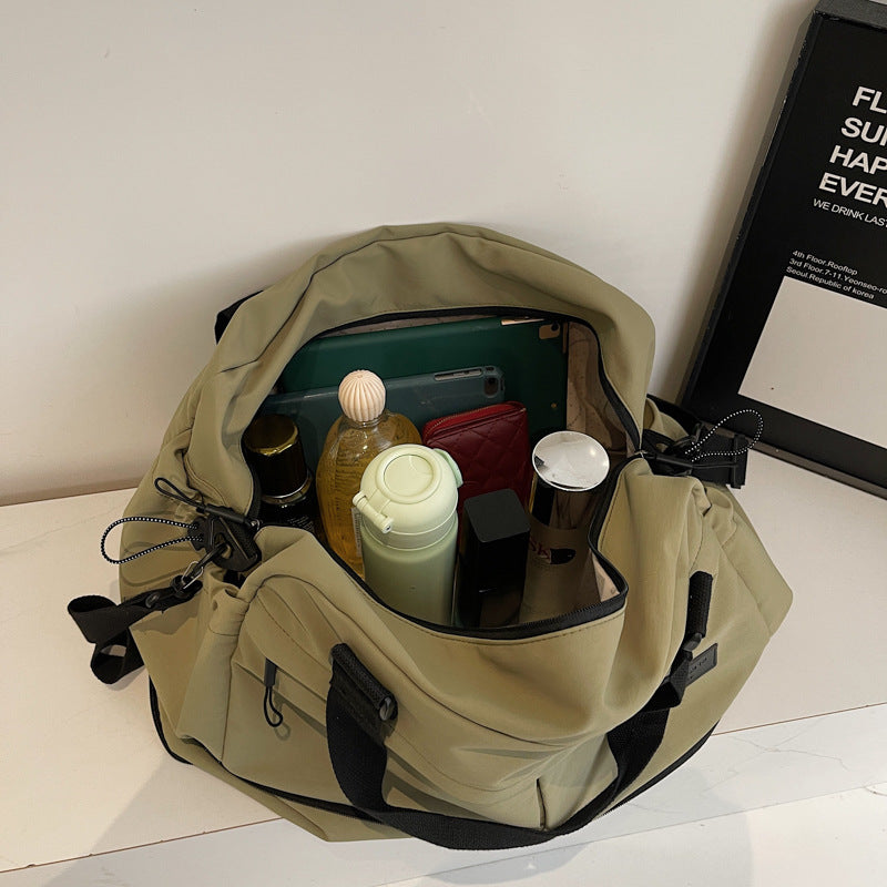 Sporty travel bag with innovative compartments Bowlift