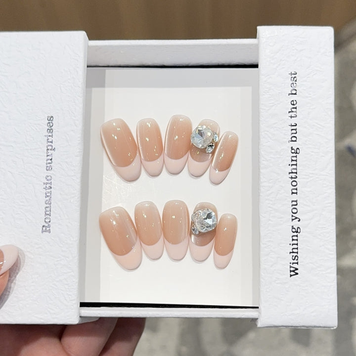 Artificial nail tips with elegant rhinestone accents Bowlift