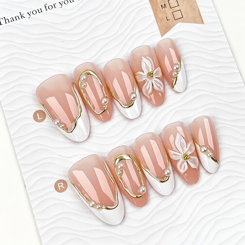 Artistic nail tips with elegant pearl design Bowlift