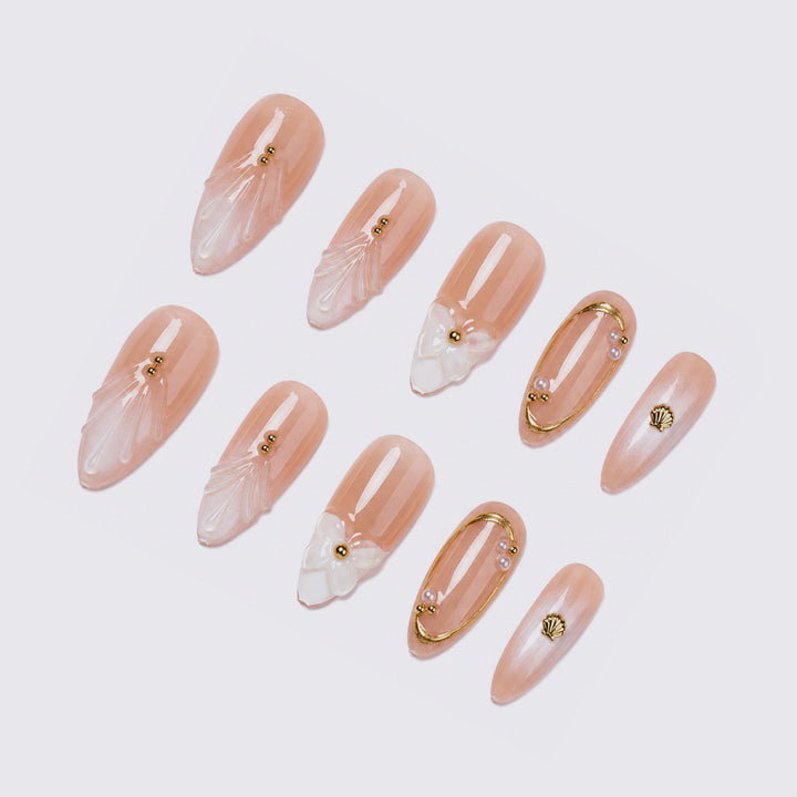 Acrylic nail set with floral and elegant embellishments Bowlift