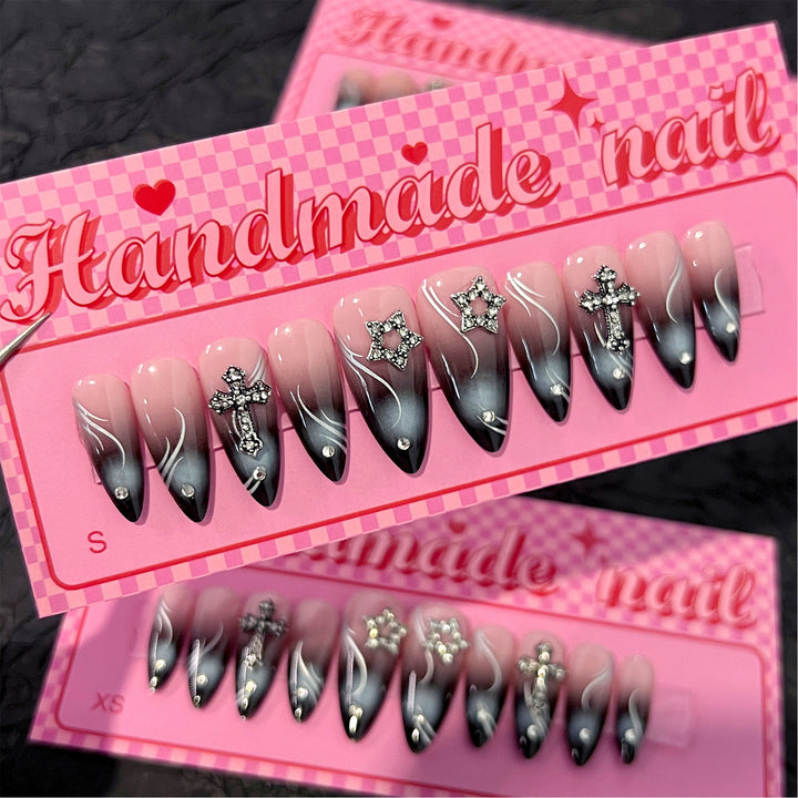 Artistic stiletto nails with elegant glitter design Bowlift