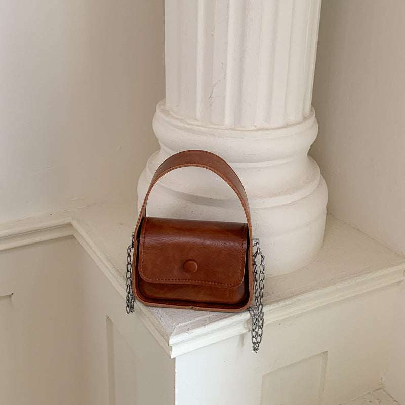 WoCompact Structured Crossbody Bag Bowlift