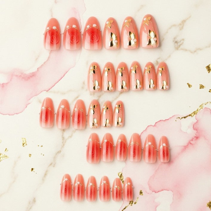Artistic Nail Tips with Elegant Gold Jewelry Bowlift