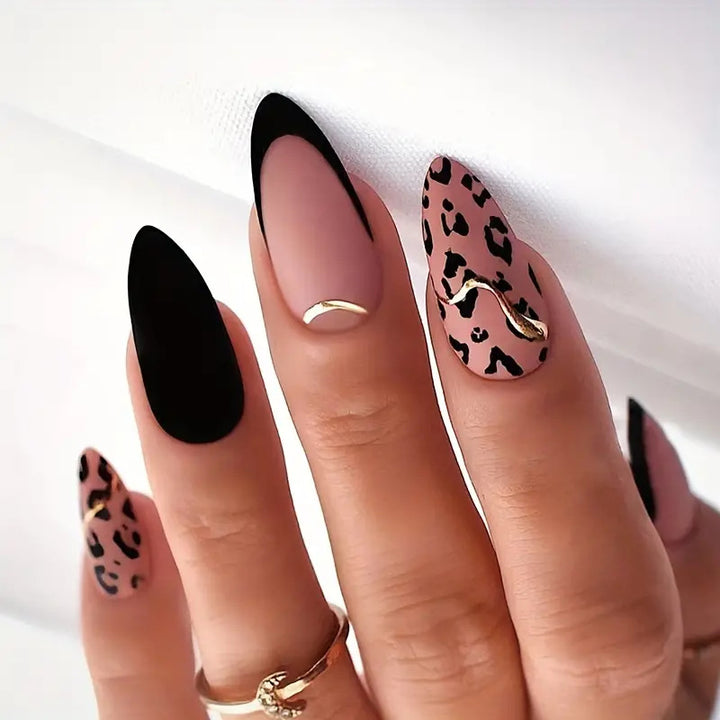 Acrylic nail set with glamorous leopard pattern and elegant accents Bowlift