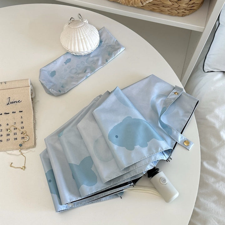 Women's foldable umbrella with unique fish pattern Bowlift