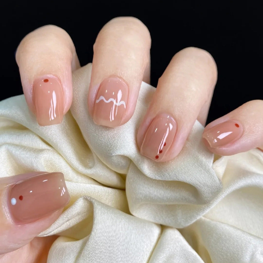 Glamorous artificial nails with delicate flower and glitter effects Bowlift