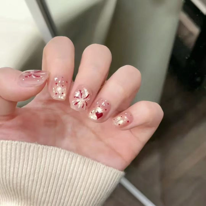 Artificial nails with romantic heart design and glitter coating Bowlift