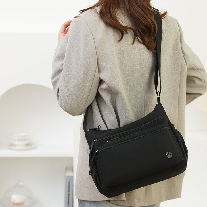 practical shoulder bag with multiple compartments Bowlift
