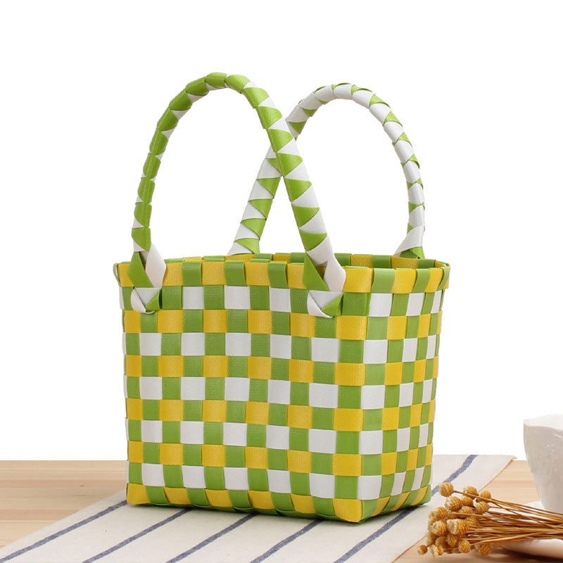 Handbag made of woven material with a stylish check pattern Bowlift