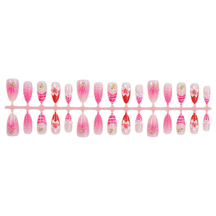 Artistic Press-On Nail Set with Floral and Decorative Accents Bowlift