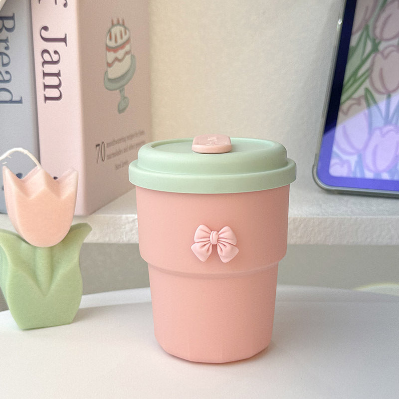 Women's Reusable Drinking Cup with Integrated Straw and Secure Closure Bowlift