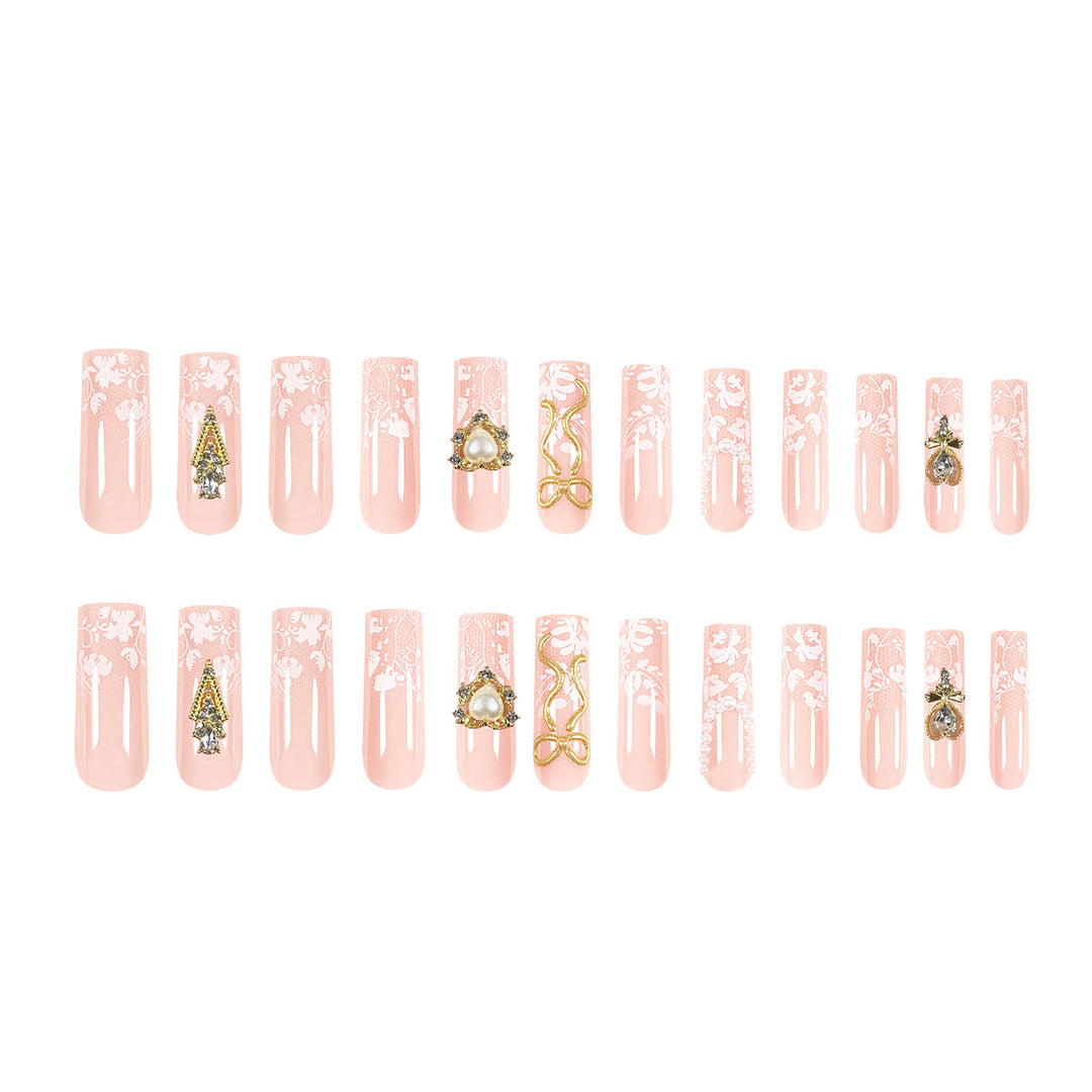Artistic Long Nails with Elegant Gold Accents Bowlift