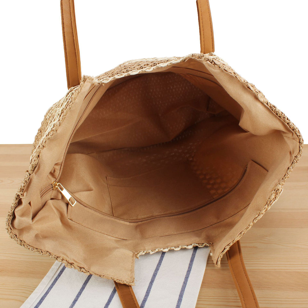 Shopping bag made of woven natural material with elegant leather handles Bowlift