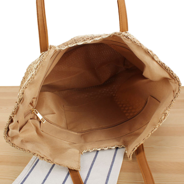 Shopping bag made of woven natural material with elegant leather handles Bowlift
