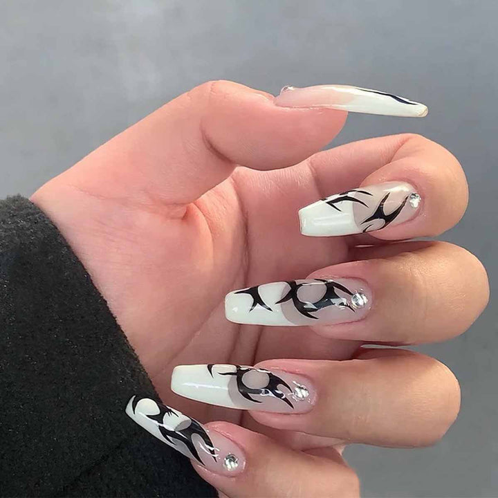 Elegant Artificial Nails with Decorative Black and Glitter Accents Bowlift