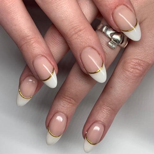 Artistic French-Tip Nails with Gold Accents Bowlift