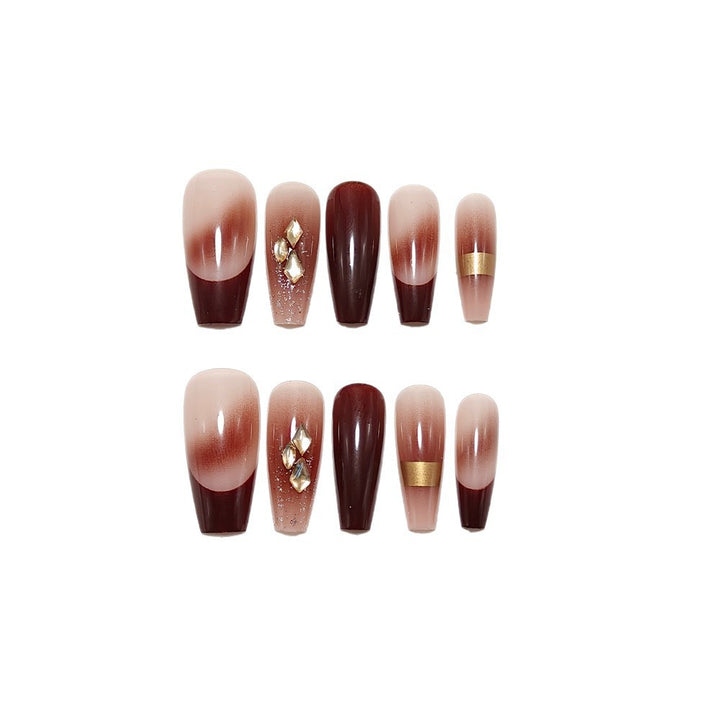 Luxurious artificial nails with glamorous decorations Bowlift