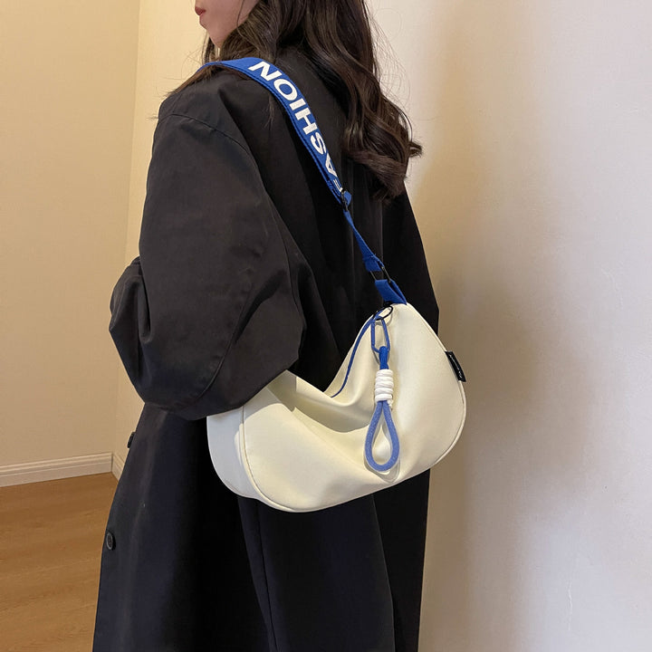 Fashionable shoulder bag with adjustable carrying strap Bowlift