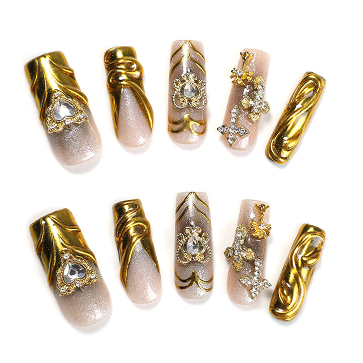 Artificial nail set with luxurious gold embellishments Bowlift
