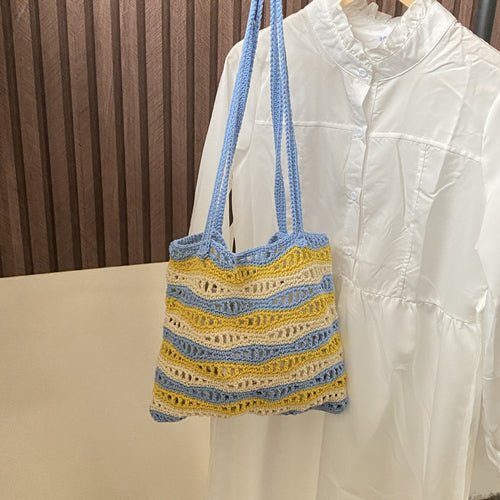 Hand-knotted beach bag with wave pattern Bowlift