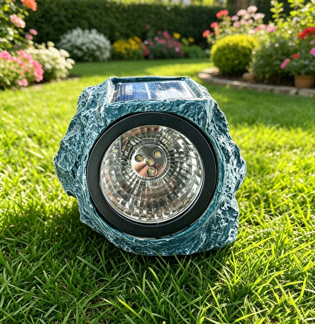 Solar powered faux stone garden spotlight with high efficiency LED array Bowlift