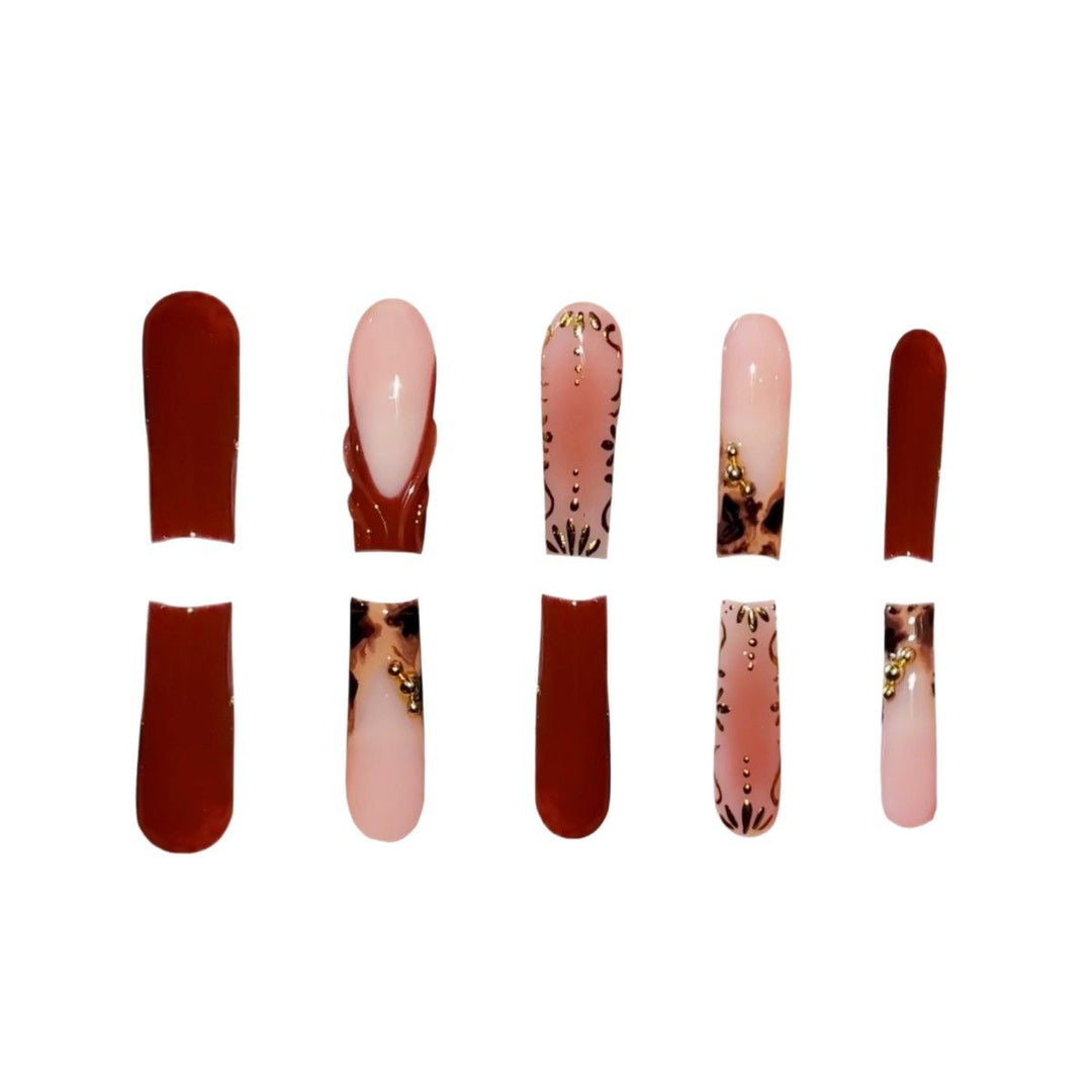 Artistic Long Press-On Nails with Elegant Gold Accents Bowlift