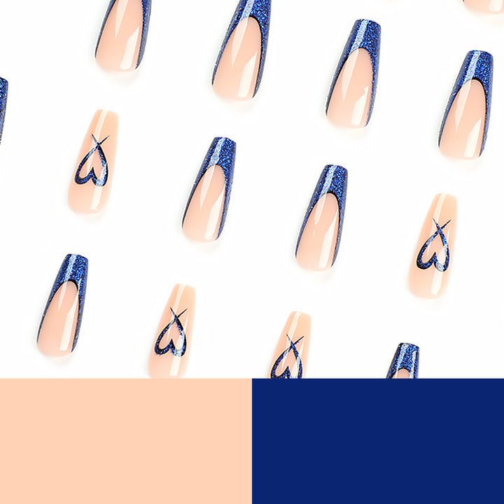 Artificial nails with glitter accents and unique heart design Bowlift