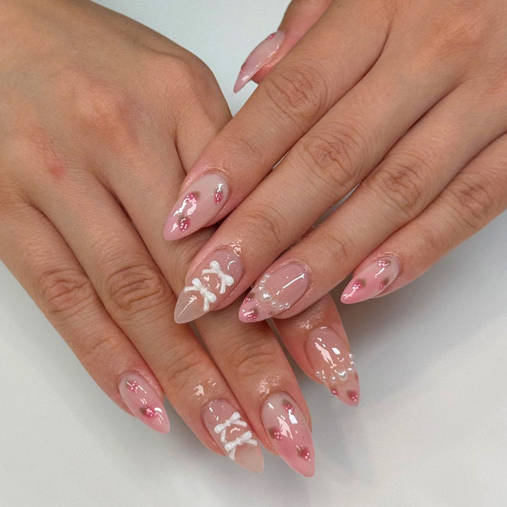 Artistic Stiletto Artificial Nails with Floral Accents Bowlift