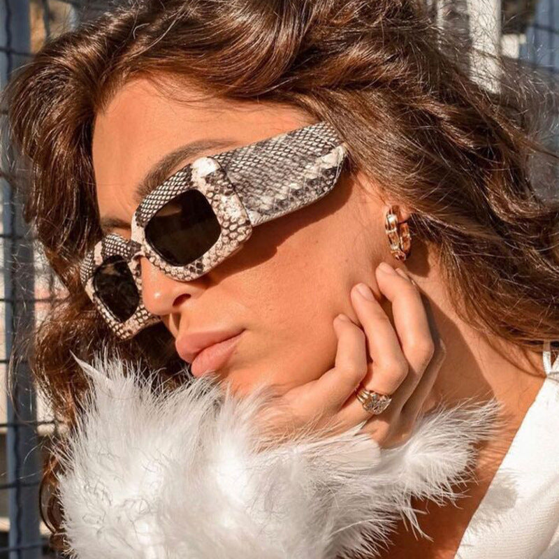 Women oversized sunglasses in fashionable snake leather look Bowlift