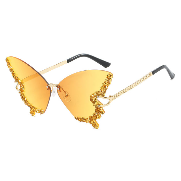 Ladies extravagant Cats Eye sunglasses with sparkling accents Bowlift