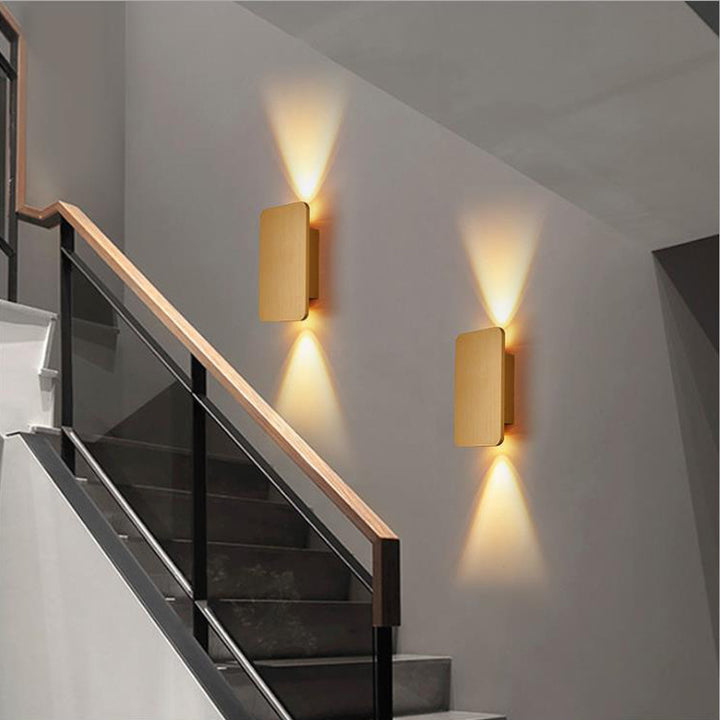 Modern rectangular LED wall sconce with dual up down beam and slim low-profile housing Bowlift