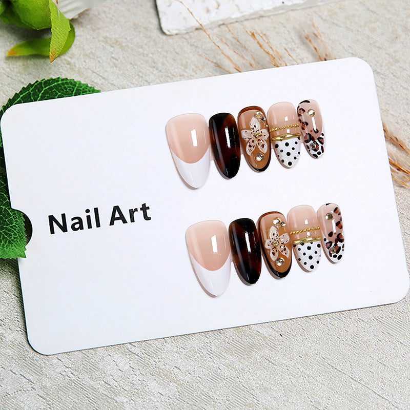Exquisite nail art with elegant embellishments Bowlift