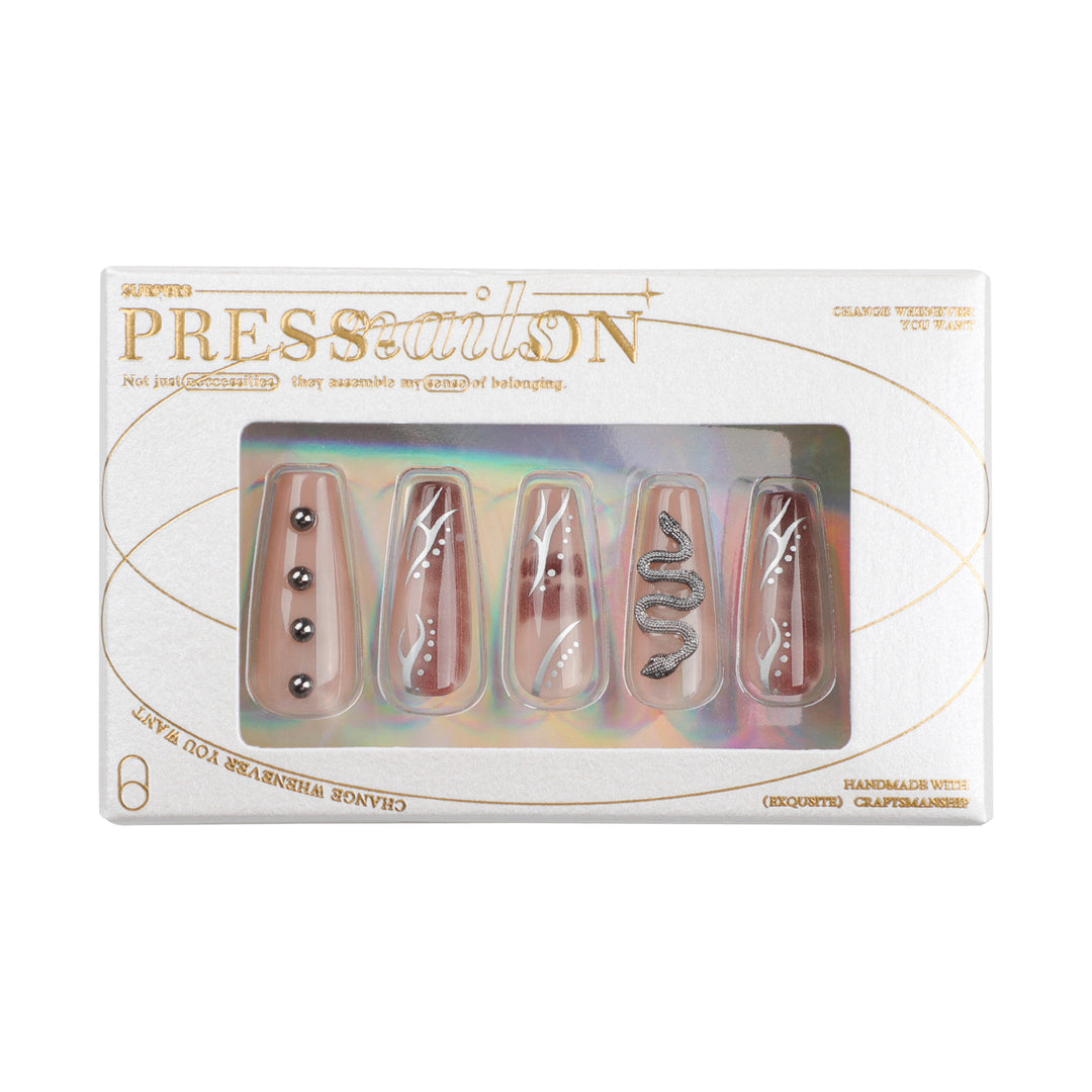 Artistic fingernails with snake and glitter accents Bowlift