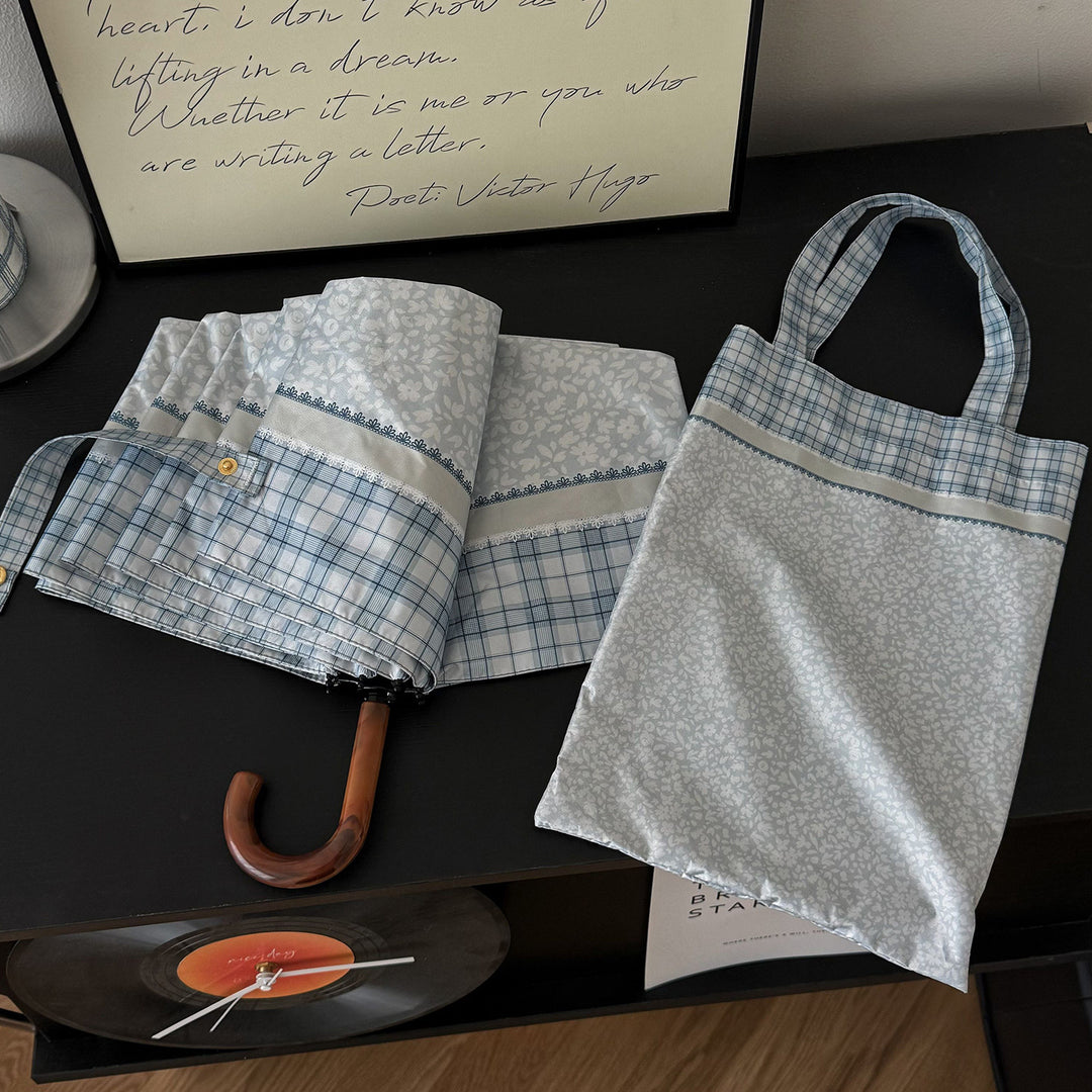 Women's tote bag with integrated folding umbrella Bowlift